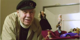 2MagicalUniverse_AlCarbeeWithBarbieDisplay1_Color_600dpi-280x140