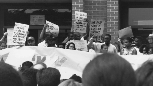 1201x782-BROTHERS-OF-THE-BLACK-LIST-Students-protest-in-front-of-the-colleges-administration-building-in-Fall-1992-Image-by-Bruce-Endries-2-1160x652